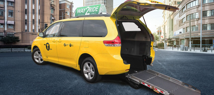 Wheelchair accessible taxis with rear access ramp