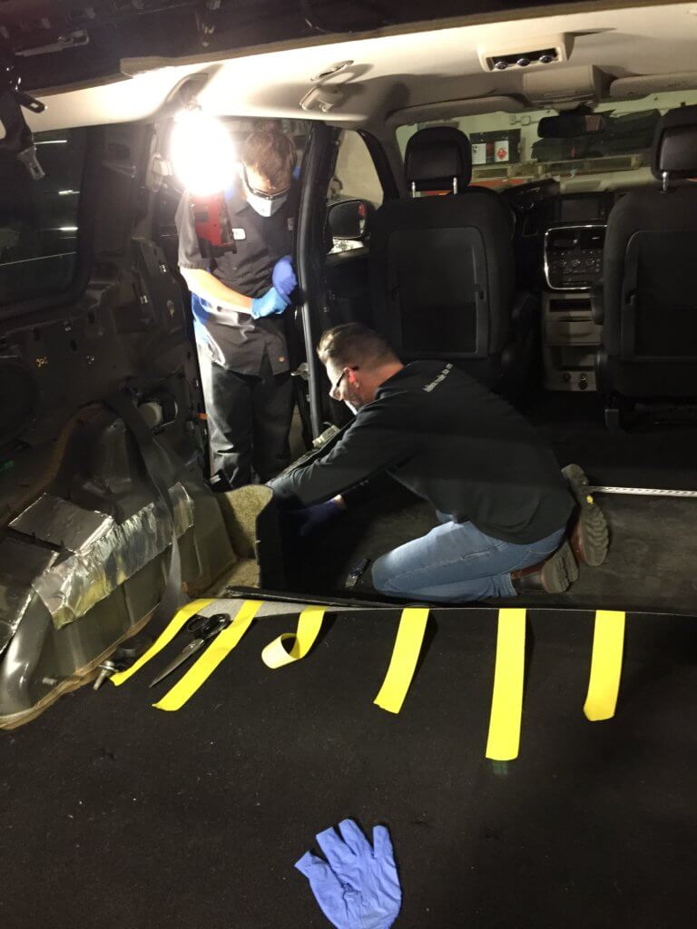 Our Driverge team installs carpet as they modify a Dodge Caravan.