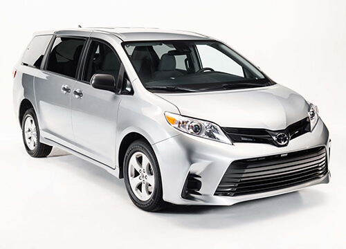 exterior of a white toyota sienna