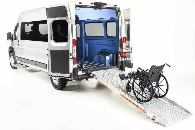 RAM ProMaster with ramp out and wheelchair on ramp