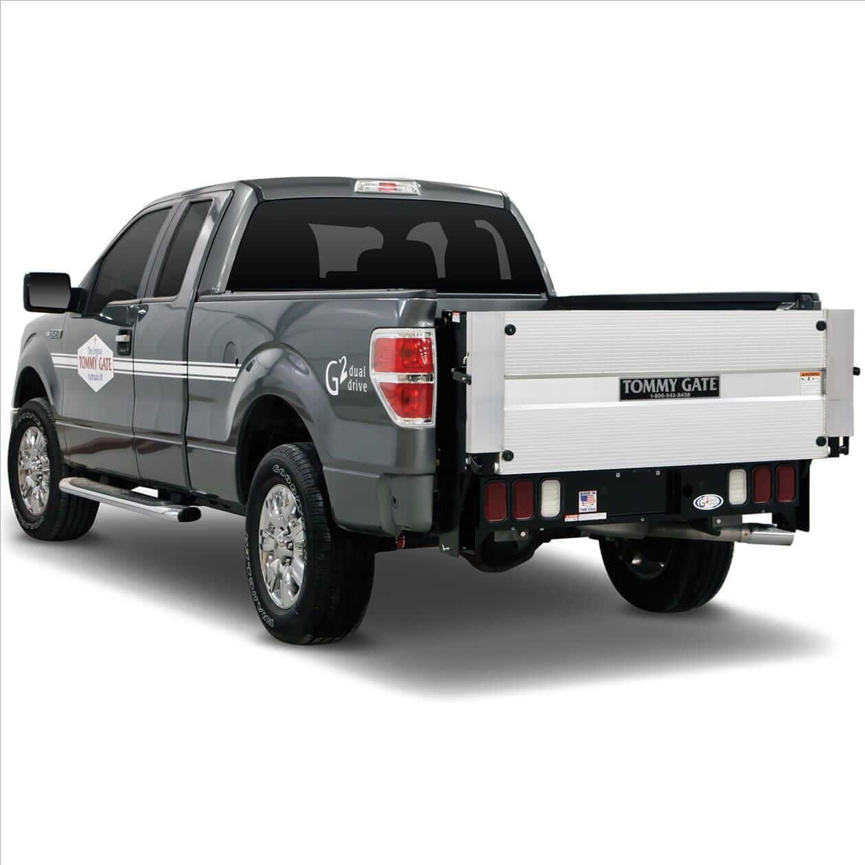 TG-Lift-Gate-Tile (2) A silver pickup truck with a Tommy Gate hydraulic liftgate installed on the rear.