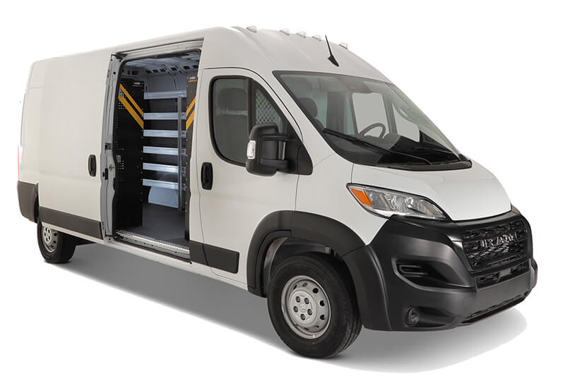 A white vocational cargo van with an open side door reveals empty shelves, ideal for a plumbers tools, and a partitioned drivers cabin for efficient work on the go. A white vocational cargo van with an open side door reveals empty shelves, ideal for a plumbers tools, and a partitioned drivers cabin for efficient work on the go.