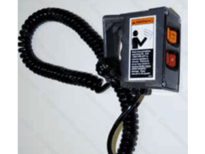 Coiled black cord attached to a gray electrical control box with warning label, orange and red buttons, and a switch.