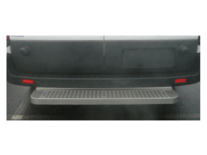 Rear view of a vehicle with a closed back door and a metal step platform beneath, parked on an asphalt surface.