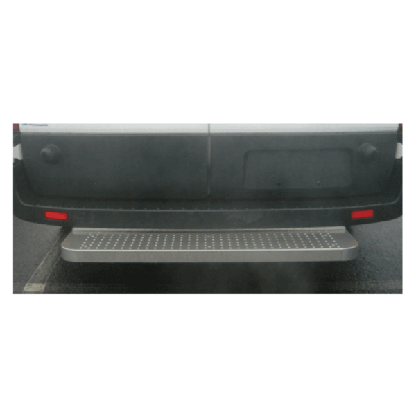 Rear view of a vehicle with a closed back door and a metal step platform beneath, parked on an asphalt surface.