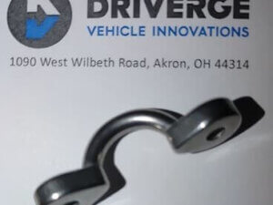 A metal bracket is placed on a surface beneath the Driverge Vehicle Innovations logo and address: 1090 West Wilbeth Road, Akron, OH 44314.