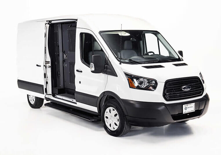 Outside view of the ford transit prision transport vehicle, side door opened to show secure door